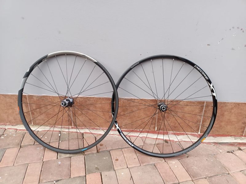 Zapletená MTB kola Shimano XT M8100