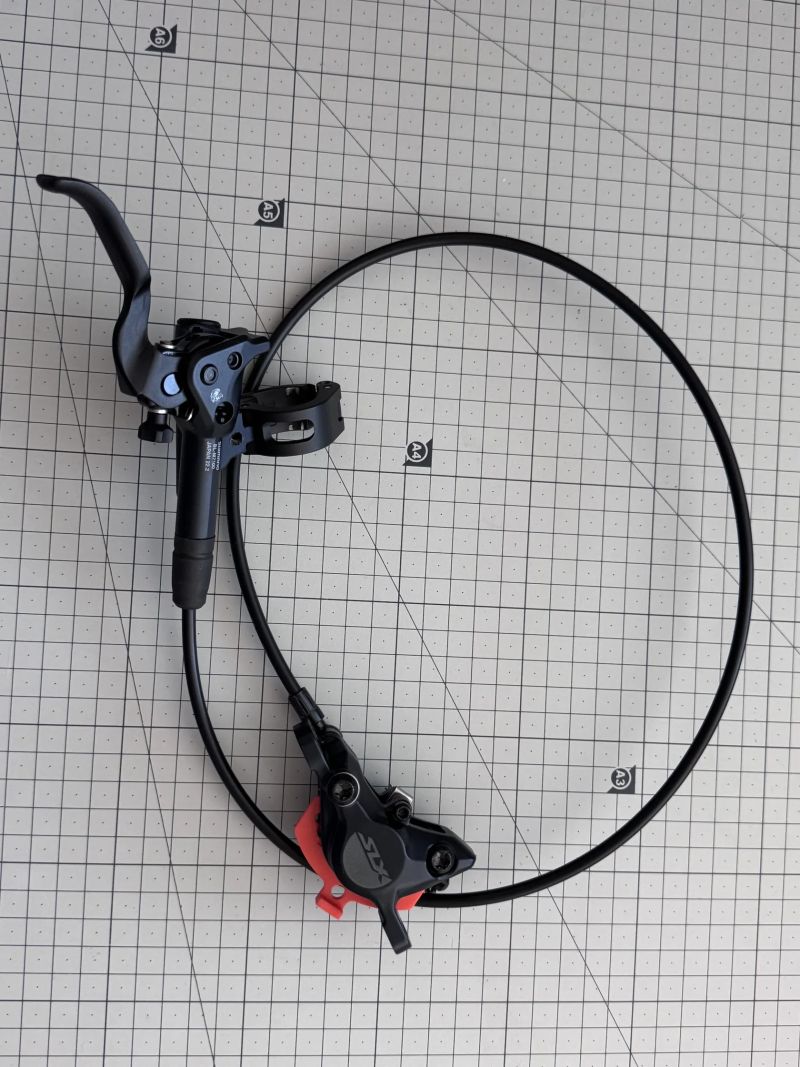 Shimano SLX přední brzda M7100, sundaná z nového kola