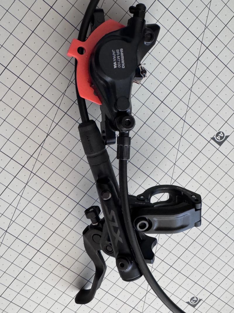 Shimano SLX přední brzda M7100, sundaná z nového kola