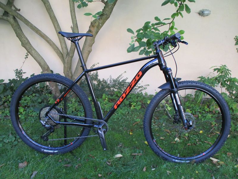 Nové 29" kolo ROZZO BOOST 30 21", Deore 1x12, vzduch. vidlice Suntour Raidon 34, pevné osy