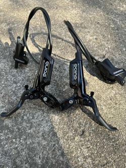 Brzdy SRAM - páky Guide R, třmeny Level