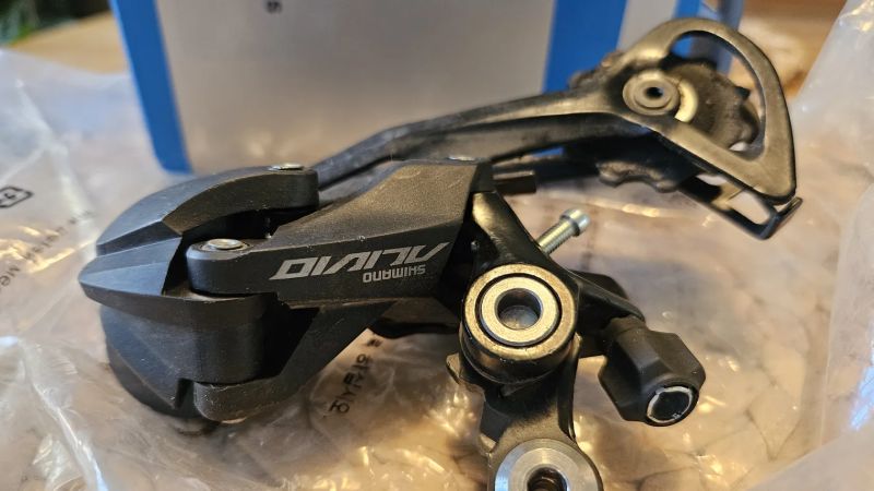 MTB Přehazovačka 9k Shimano Alivio RD-M3100 černý dlouhé vodítko