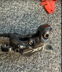 Brzdy Shimano XT BR-M8220 - set - přední a zadní, destičky Galfer fialové