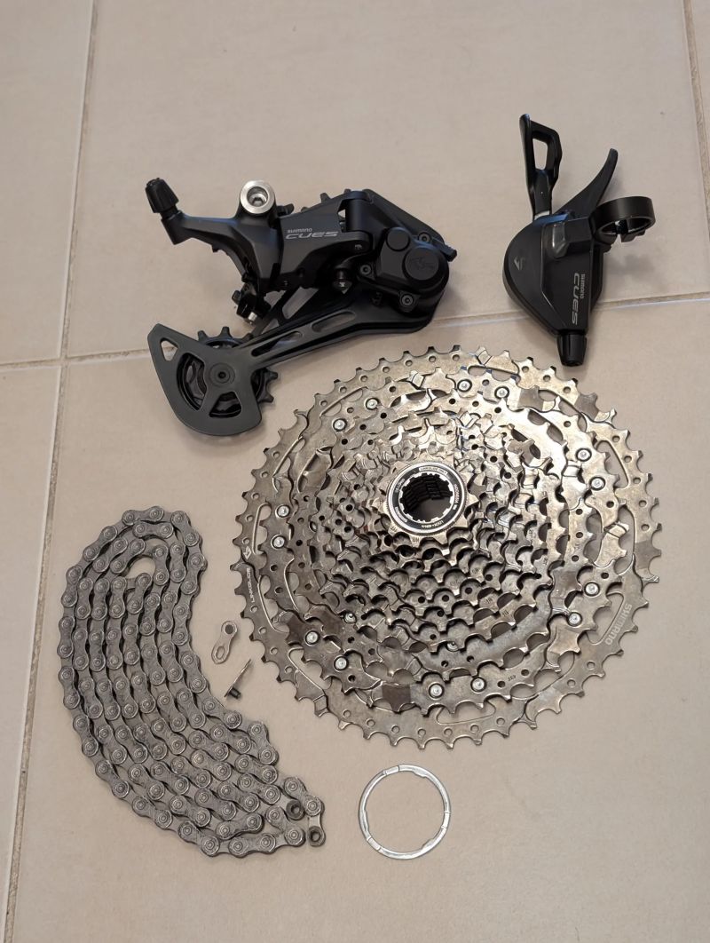 Prodám Shimano CUES - řazení přehazovačku, kazetu a řetěz