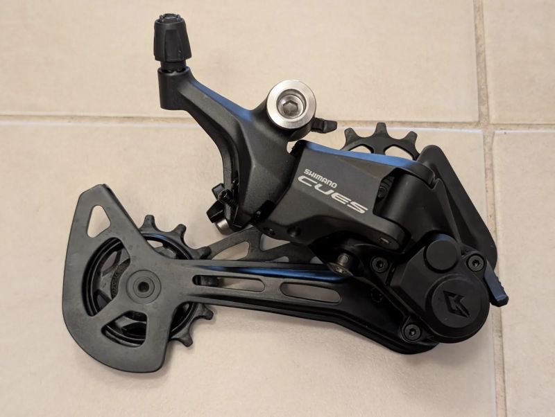 Prodám Shimano CUES - řazení přehazovačku, kazetu a řetěz