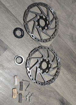 Komplet brzdy Shimano SM RT 64M 180 a metal. desky typu D