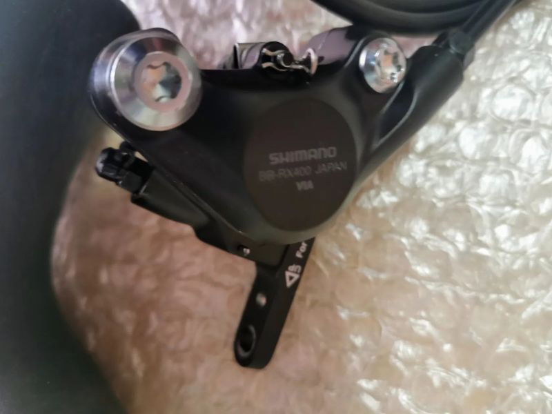 Brzda Shimano GRX ST-RX600 + rx400 levá přední 