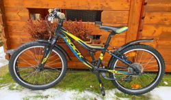 Dětské kolo 20" Rock Machine Surge 4-9let postava 100-135cm.