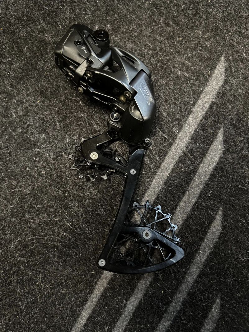 Přehazovačka Sram GX AXS + Garbaruk