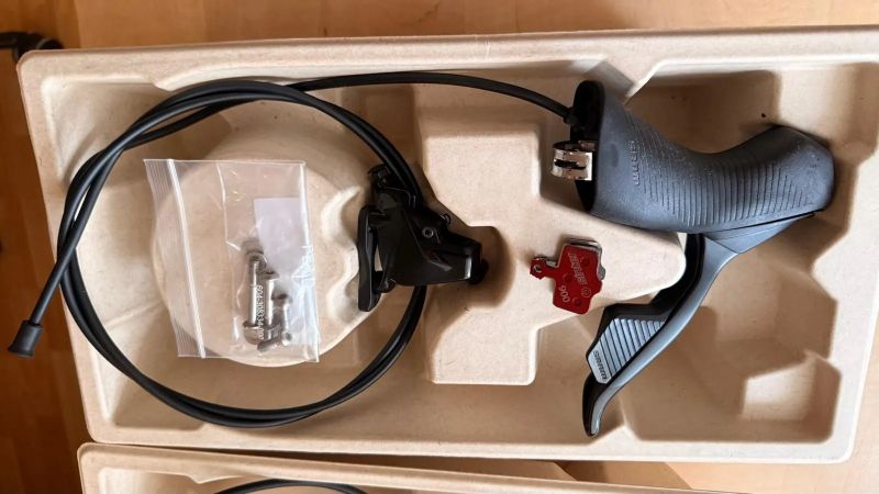 Řadicí a brzdové páky Sram Rival eTap AXS D1 1x12 + třmen Rival Flat