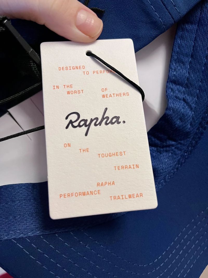 Nová cyklistická čepice Rapha Trail Lightweight Cap - Navy/Orange