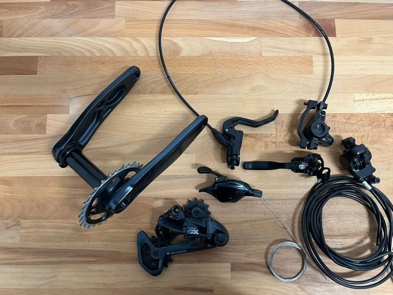 Sada SRAM GX Eagle + brzdy Magura (sundáno z nového kola)