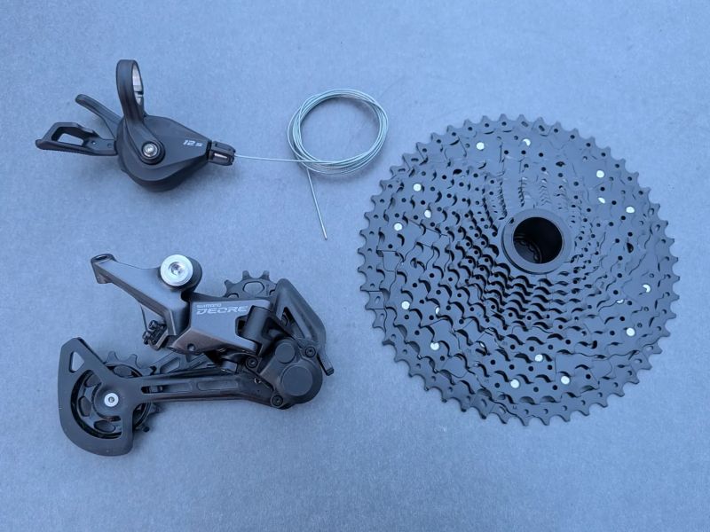 sada Shimano Deore 1x12 na HG ořech