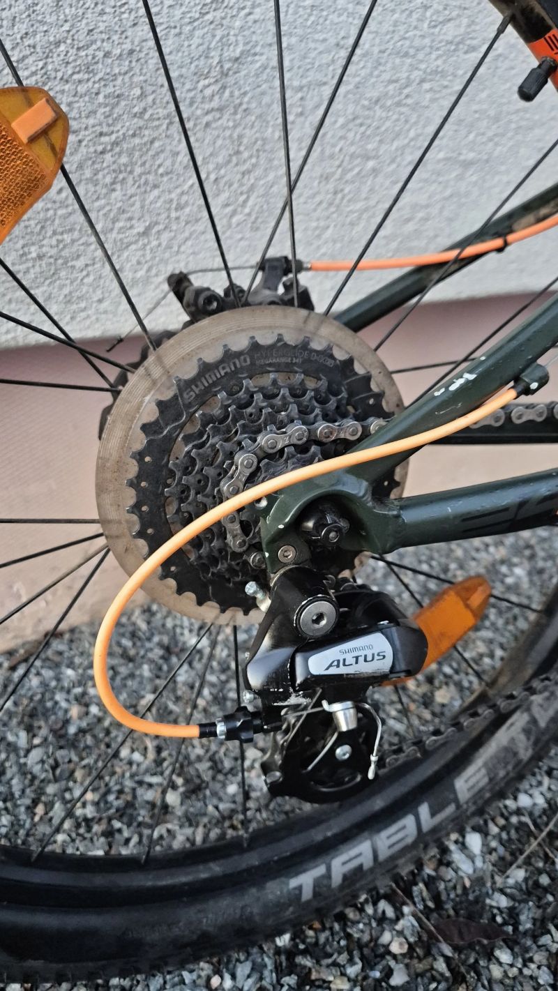 Lehké dětské kolo Rock Machine Blizz 24 – matná zelená/oranžová