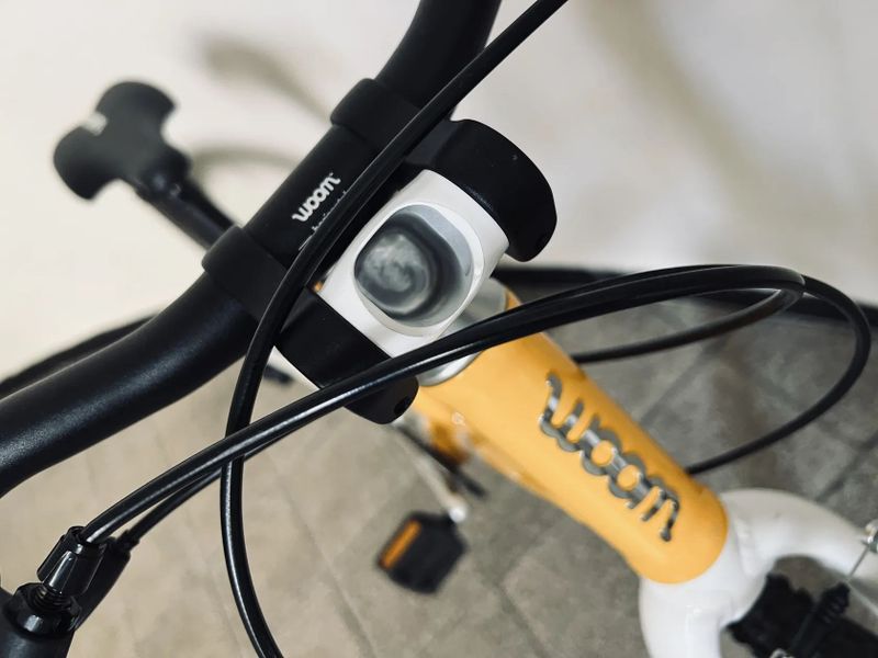 PRODÁM WOOM 4 - k tomu zdarma sada nových blikaček (přední + zadní)