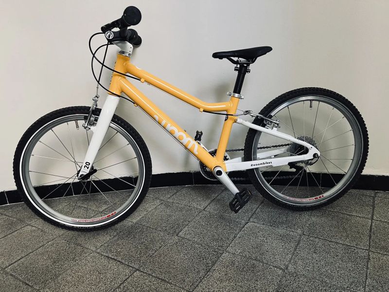 PRODÁM WOOM 4 - k tomu zdarma sada nových blikaček (přední + zadní)