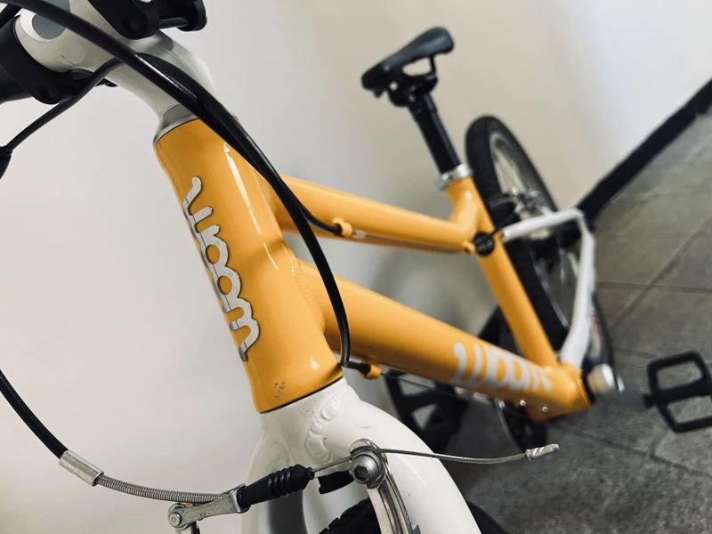 PRODÁM WOOM 4 - k tomu zdarma sada nových blikaček (přední + zadní)