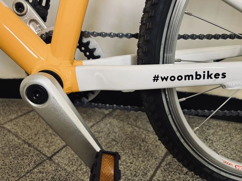 PRODÁM WOOM 4 - k tomu zdarma sada nových blikaček (přední + zadní)