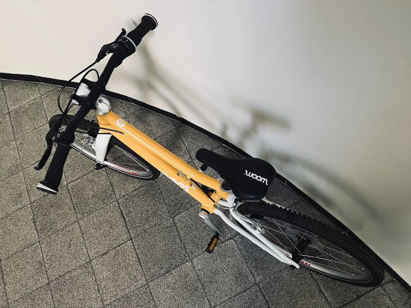 PRODÁM WOOM 4 - k tomu zdarma sada nových blikaček (přední + zadní)