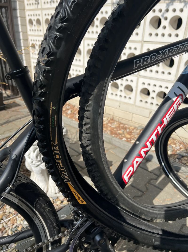 Panther PRO XR777 3x9 Deore XT + hydraulické brzdy + Deore náboje + 2x pláště