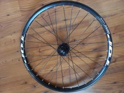 Zapletené přední kolo REMERX 24", disk - NOVÉ