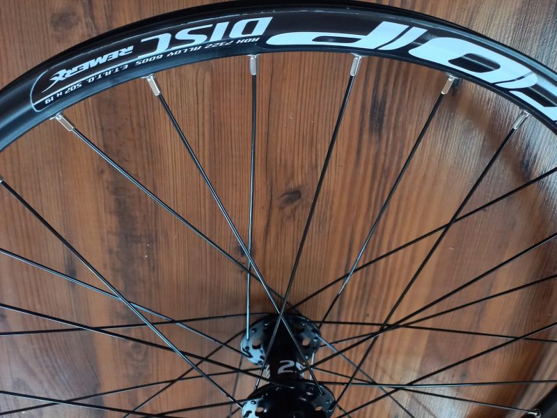 Zapletené přední kolo REMERX 24", disk - NOVÉ