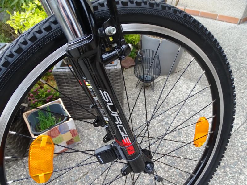 Rock Machine Surge 24" + cyklocomputer Sigma