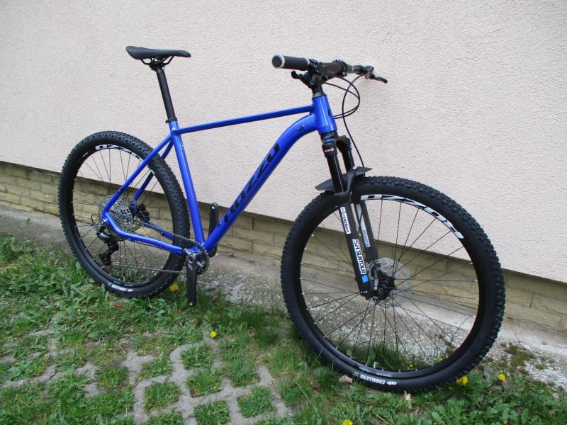 Nové 29" kolo ROZZO BOOST 30 21", Deore 1x12, vzduch. vidlice Suntour Raidon 34, pevné osy