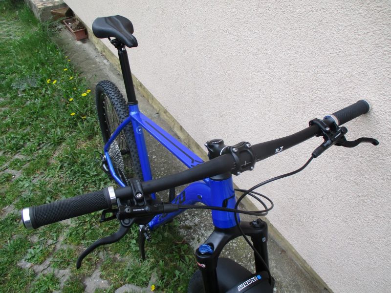 Nové 29" kolo ROZZO BOOST 30 21", Deore 1x12, vzduch. vidlice Suntour Raidon 34, pevné osy