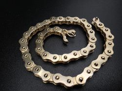 Zlatý náramek - řetěz na kolo 