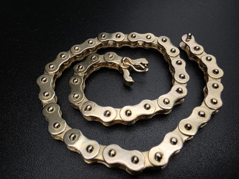 Zlatý náramek - řetěz na kolo 