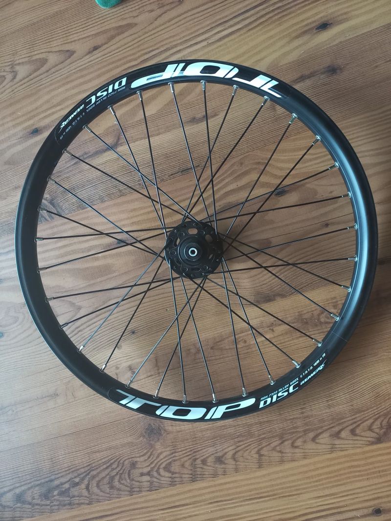 Zapletené přední kolo Remerx 20" pro kotoučovou brzdu - NOVÉ