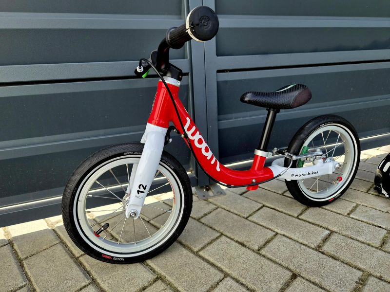 (83) Dětské lehké odrážedlo Woom 1 + Helma Woom