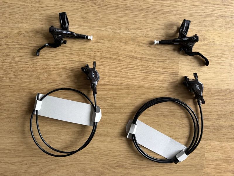 Brzdy Shimano XT - nová sada vč. kotoučů