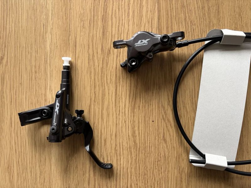 Brzdy Shimano XT - nová sada vč. kotoučů