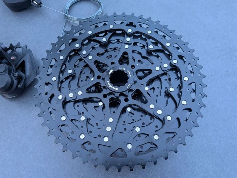 sada Shimano Deore 1x12 na HG ořech