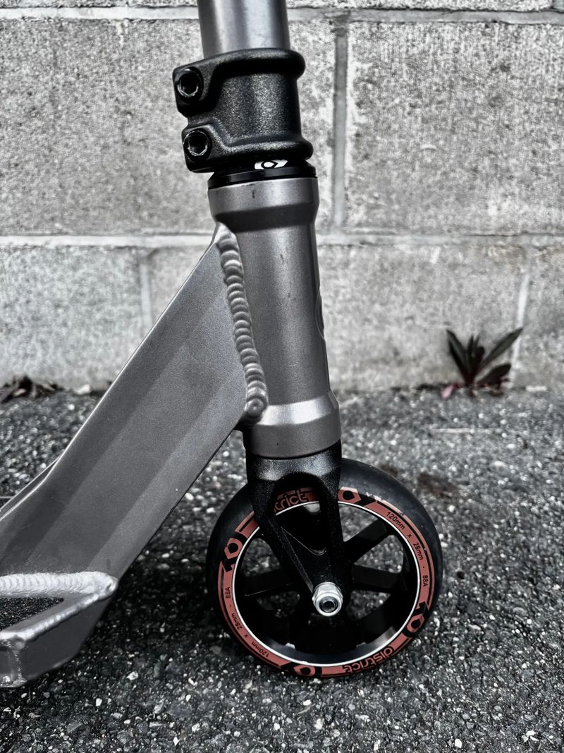 Freestyle koloběžka District