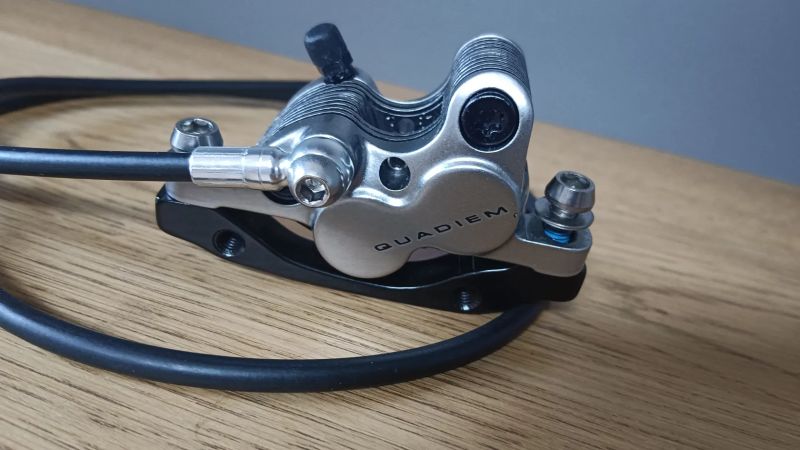 brzda přední levá TRP Quadiem G-Spec NOVÉ