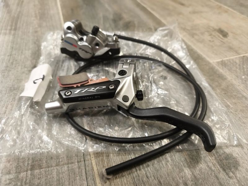 brzda přední levá TRP Quadiem G-Spec NOVÉ