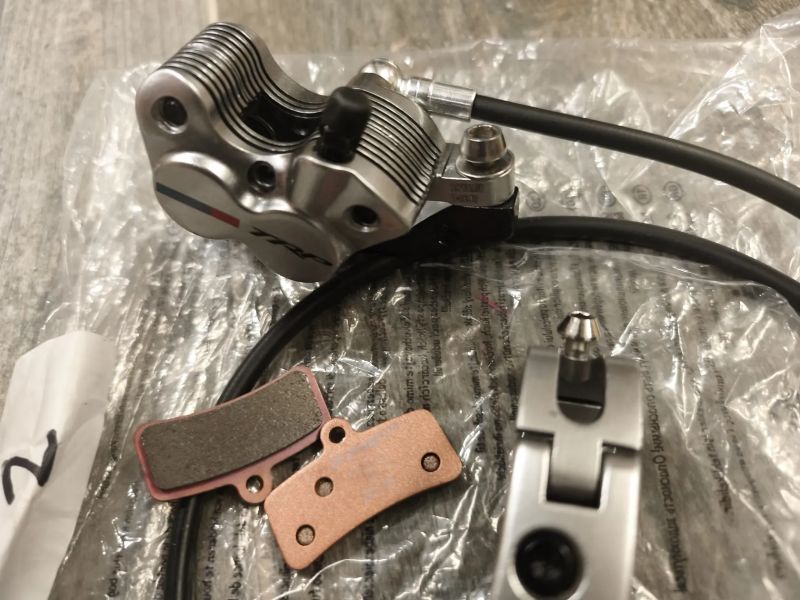 brzda přední levá TRP Quadiem G-Spec NOVÉ