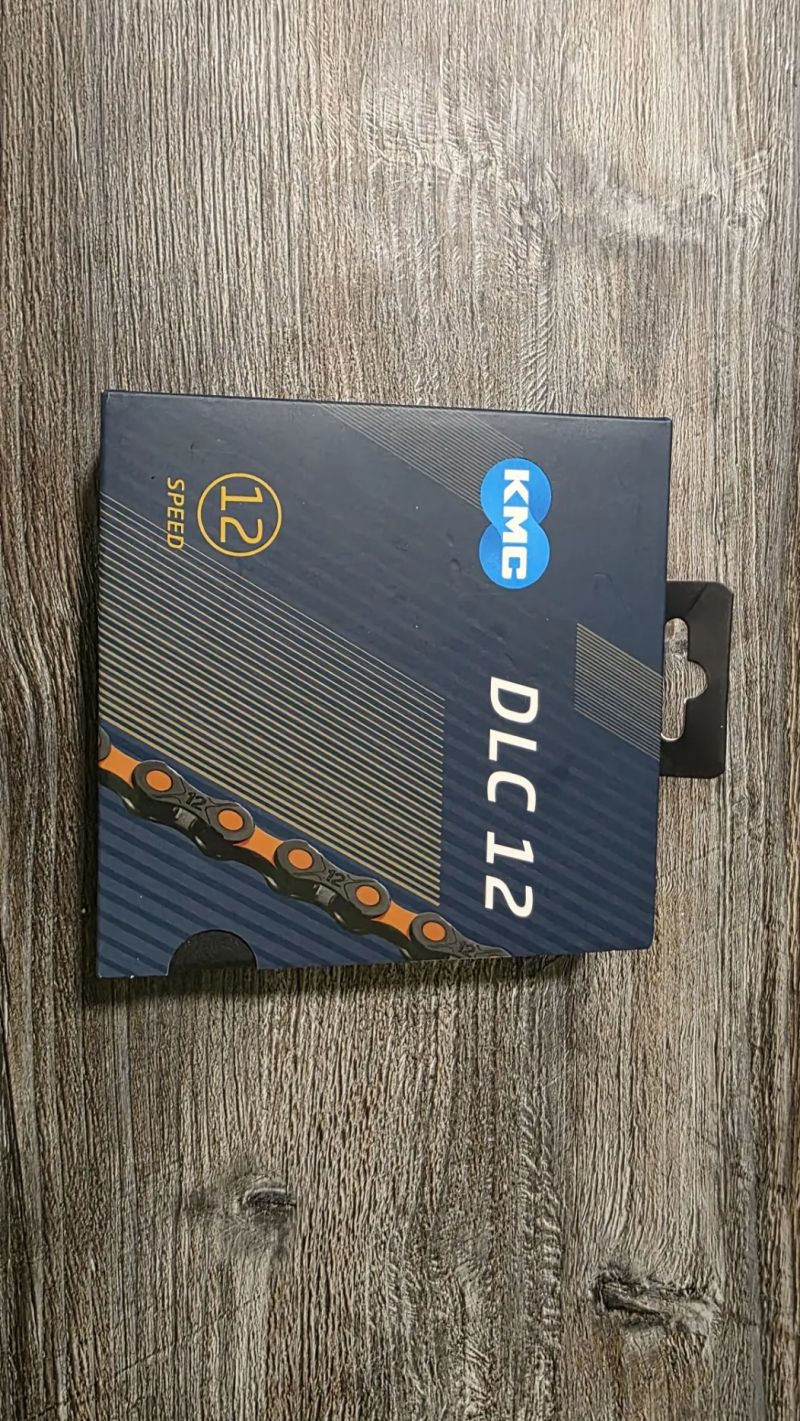 Řetěz KMC DLC 12 - oranžovo-černá - najeto 50 km.