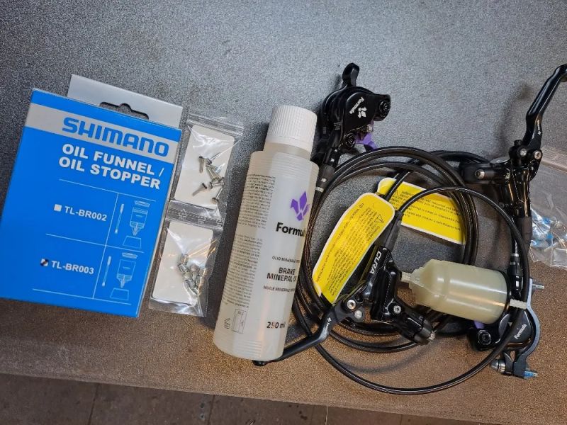NOVÉ kompletní brzdy Formula Cura včetně b. destiček, odvzdušňovací sady a kapaliny