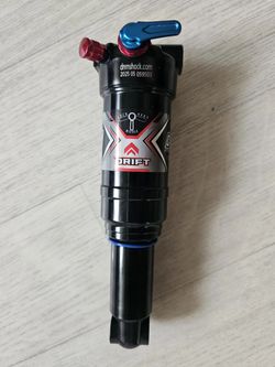 Tlumič DNM Performance Suspension Trunnion 8RC 185x52