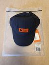 Nová cyklistická čepice Rapha Trail Lightweight Cap - Grey/Orange