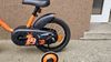 Prodám dětské kolo Btwin 500 Robot 14" oranžovo-černá barva, včetně stabilizačních koleček.