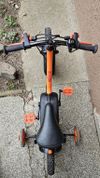 Prodám dětské kolo Btwin 500 Robot 14" oranžovo-černá barva, včetně stabilizačních koleček.