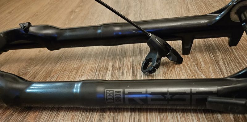 Odpružená vidlice Rock Shox REBA, BOOST, 110mm, 29" včetně páčky