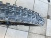 Přední kolo s nábojem Shimano SLX a ráfkem KLS plášťem Maxxis a kotoučem Shimano 203 mm