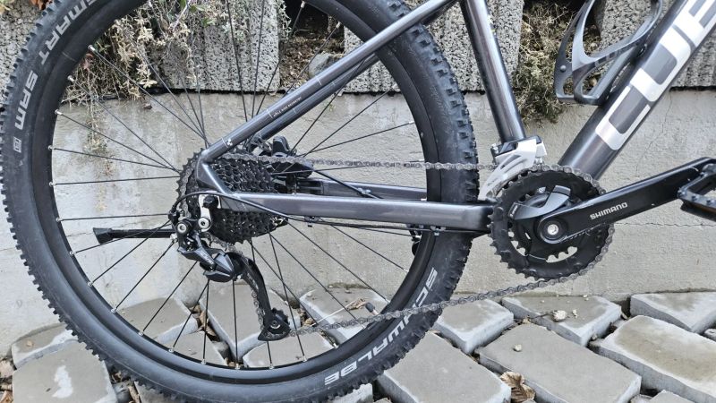 Cube AIM SL vel. S/M- barva Graphite'n'Metal 