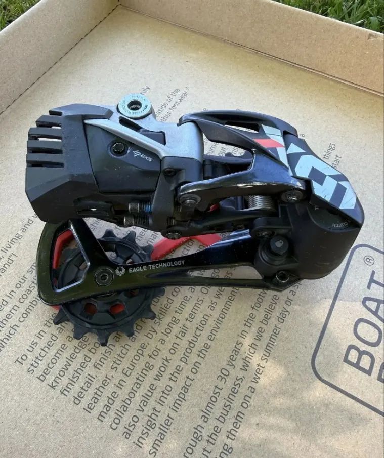 Kliky Sram X0 karbon, Přehazovačka X0 Eagle AXS, kazeta XX1, řetěz XX1, ovládací páčka SramAXSRocker
